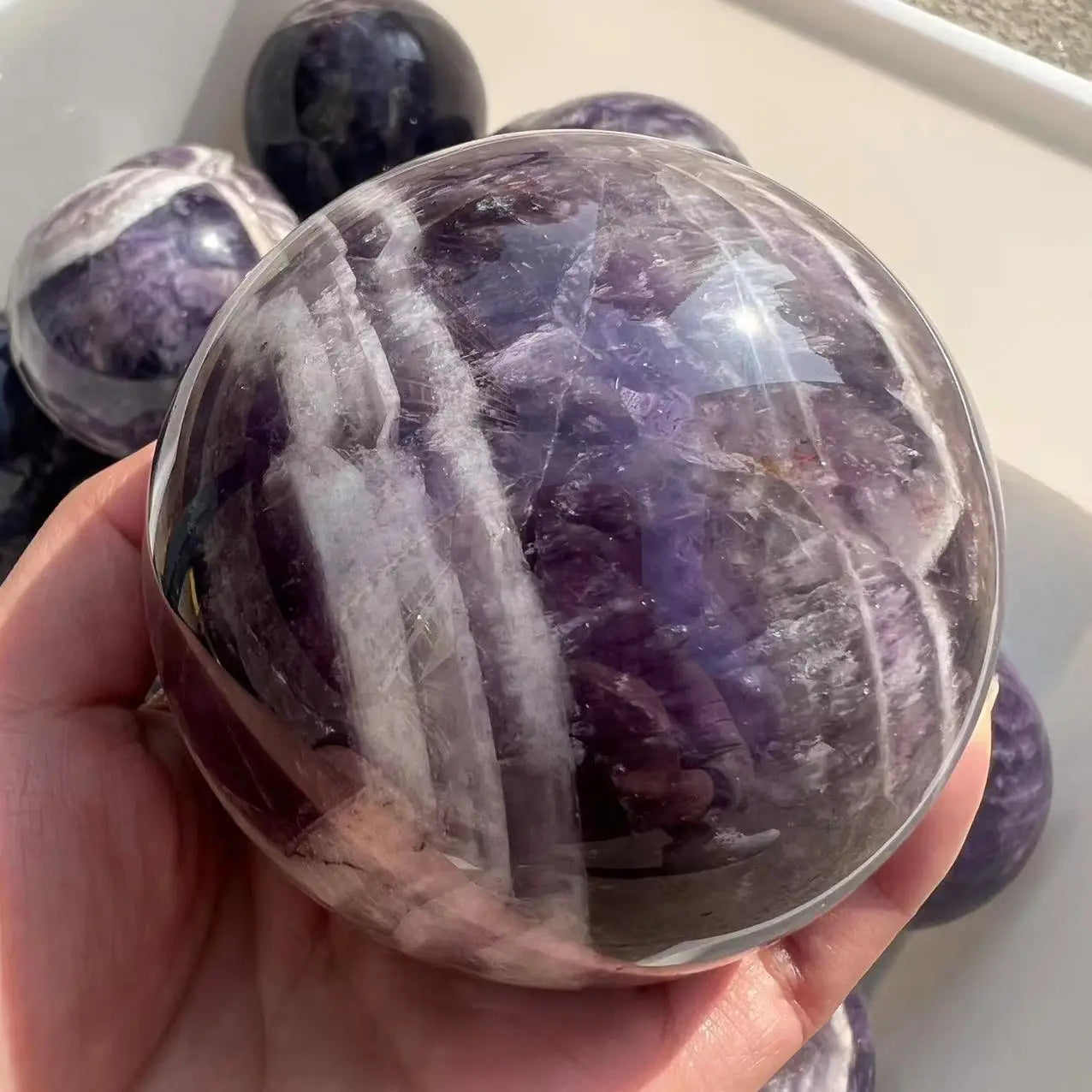 8.5cm Natural Dream Amethyst Sphere – Polished Crystal Ball for Reiki Healing & Room Decor - Image 4